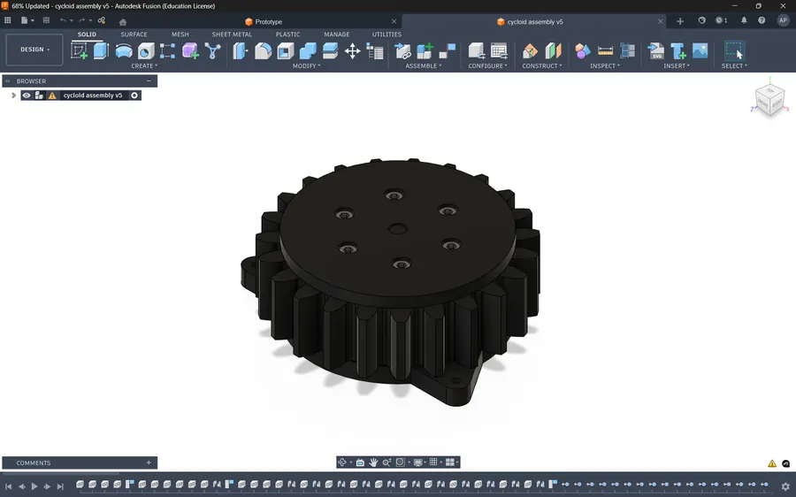 The cycloidal drive assembly open in Autodesk Fusion, showing the output plate with its bolt circle sitting over the ring of pins in the housing