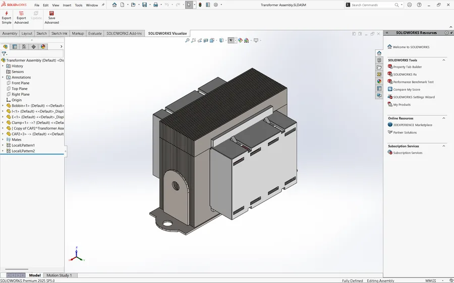 The transformer assembly open in SolidWorks, feature tree listing bobbin, E and I laminations, clamp and caps